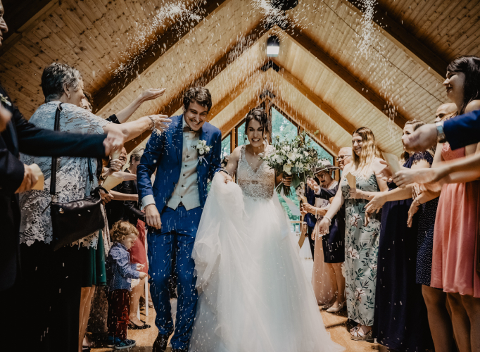 Bride and groom confetti celebration