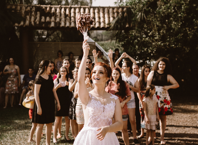 Bride throwing bouquet