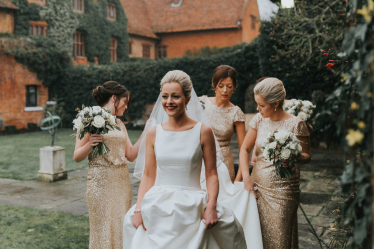 Bride with bridal party at woodhall manor