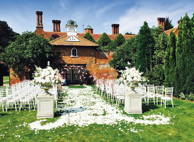 Woodhall Manor set up ready for an outdoor ceremony