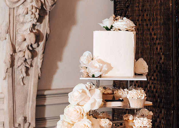 wedding cake and cupcakes